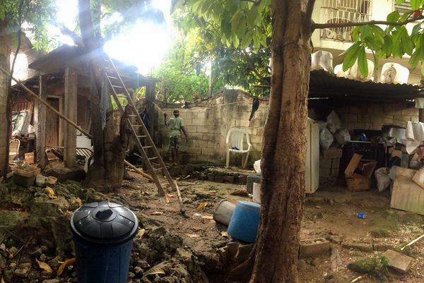 Houses are built of scraps of tin and wood