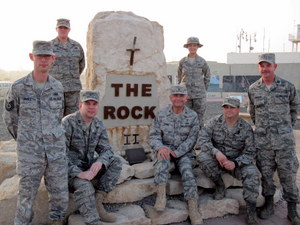 Fr. Bob Bruno, OFM, (center) during a deployment in Kuwait in 2010