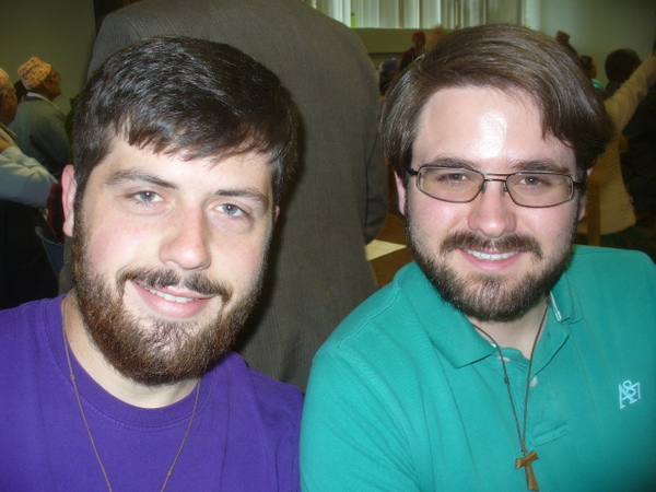 Postulants Carlo Shivel and Tom Murphy teach refugees what it means to become American.